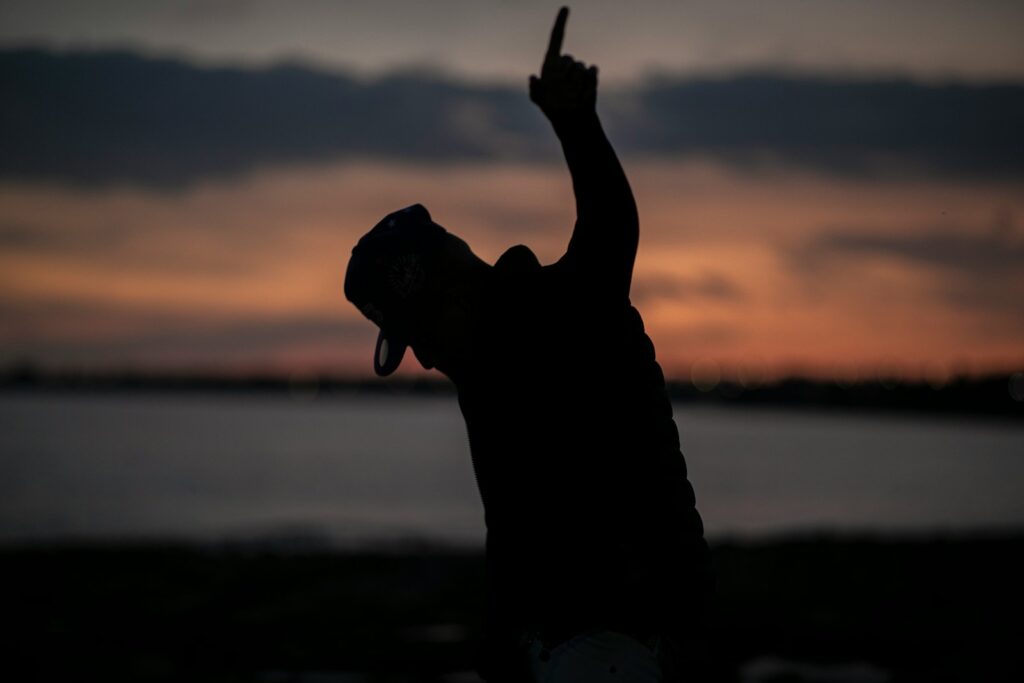 a person with their hand up